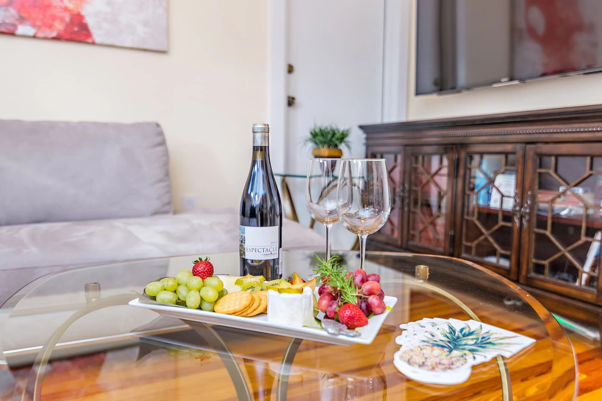 Image of Sundance South Suite private sitting area with Fruit and Cheese Tray, available for purchase